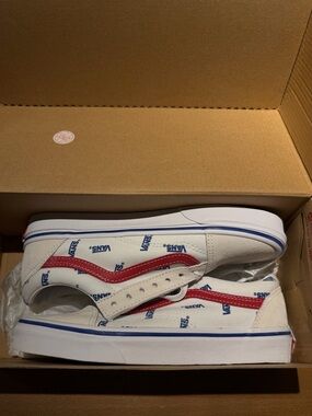 Vans True White Low Top Sneakers with Red Stripe and Blue Logo Print